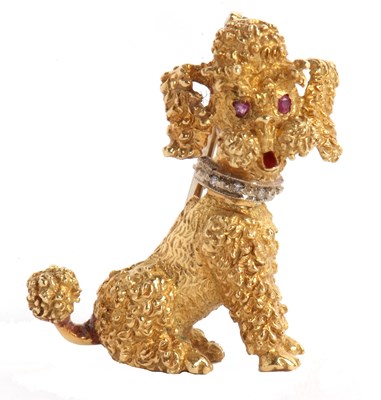 Lot 69 - An 18ct poodle brooch, the seated poodle set...