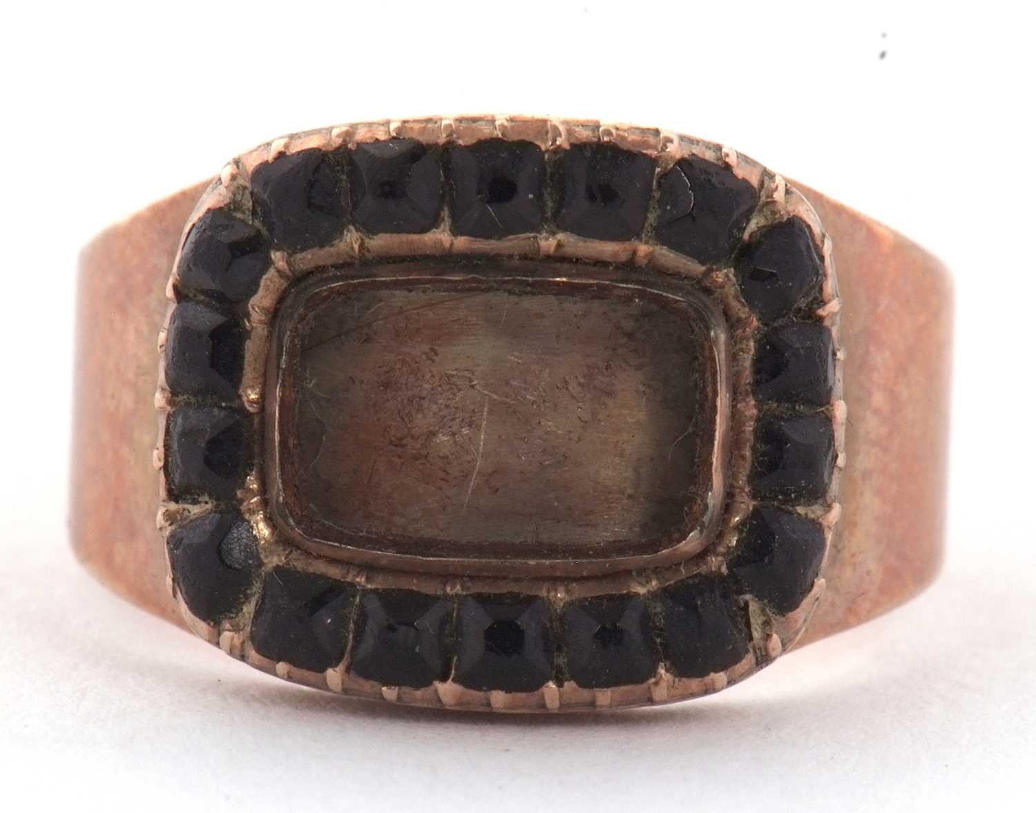 Lot 31 - An early 19th century memorial ring, the...