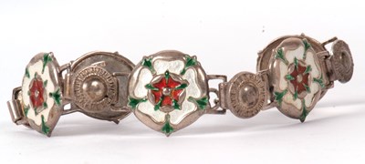 Lot 114 - A silver and enamel bracelet, the five Tudor...