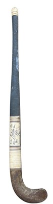 Lot 154 - A vintage Bulldog field hockey stick, bearing...