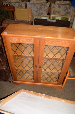 Lot 753 - OAK EFFECT GLAZED TWO DOOR BOOKCASE