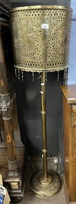 Lot 537 - An Oriental brass standard lamp with unusual...