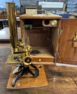 Lot 491 - A lacquered brass monocular microscope,...