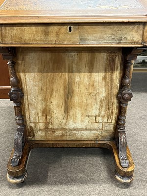 Lot 515 - A Victorian walnut Davenport desk of typical...