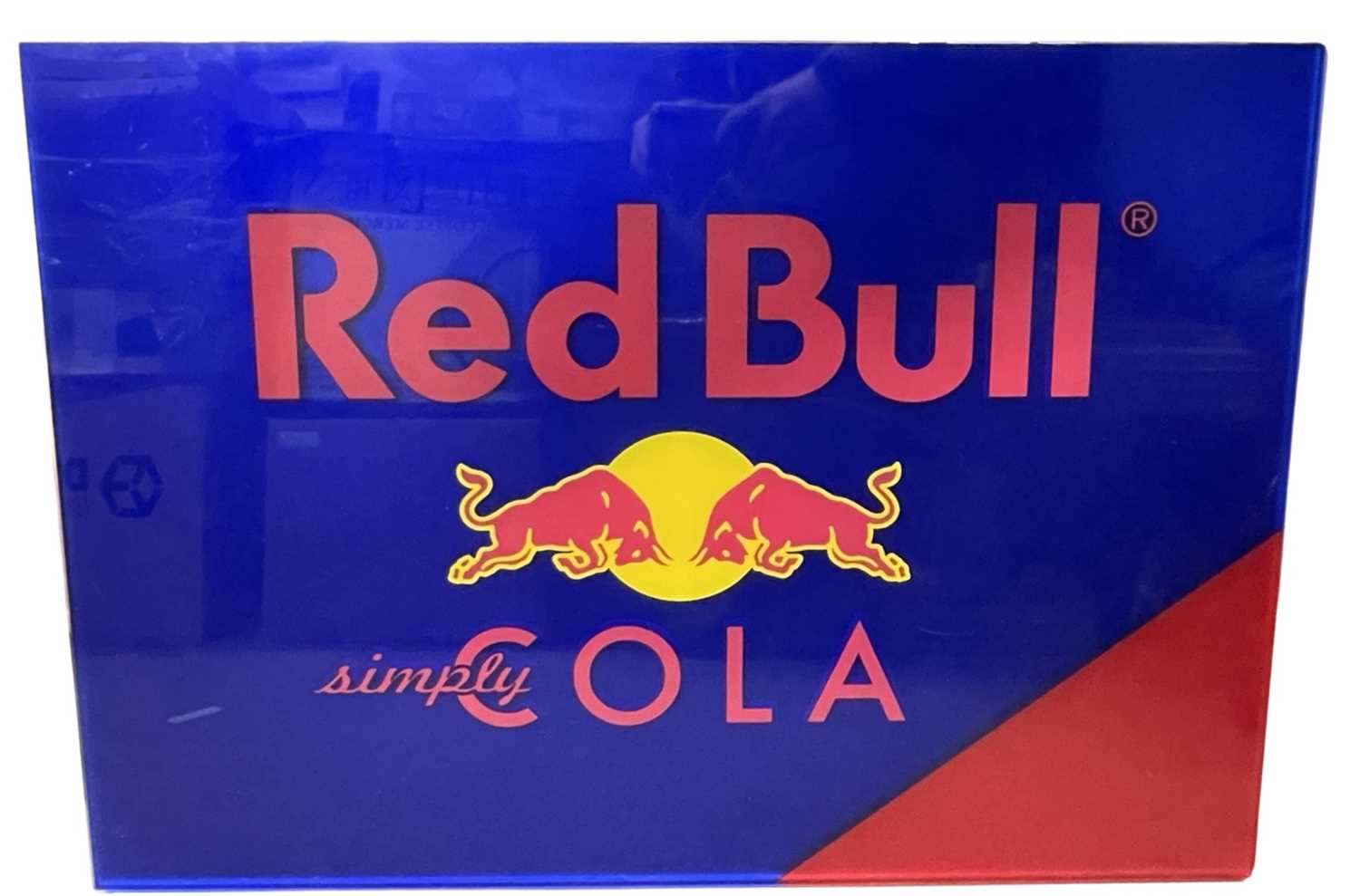 Lot 245 - An advertising sign for Red Bull energy drink,...