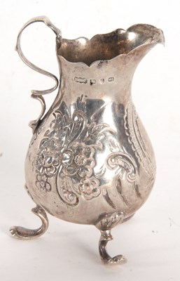 Lot 10 - A late Victorian silver cream jug having a...