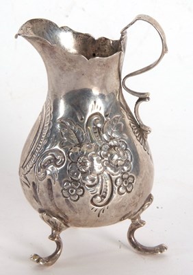Lot 10 - A late Victorian silver cream jug having a...