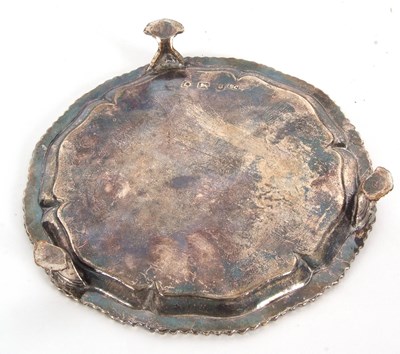 Lot 15 - A George III silver card salver of circular...