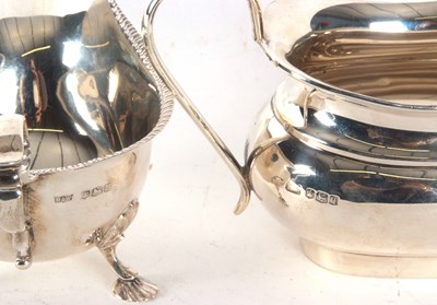 Lot 69 - Mixed Lot: A George V silver sauce boat of...