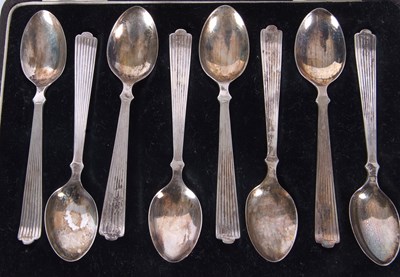 Lot 78 - A cased set of eight George VI silver...