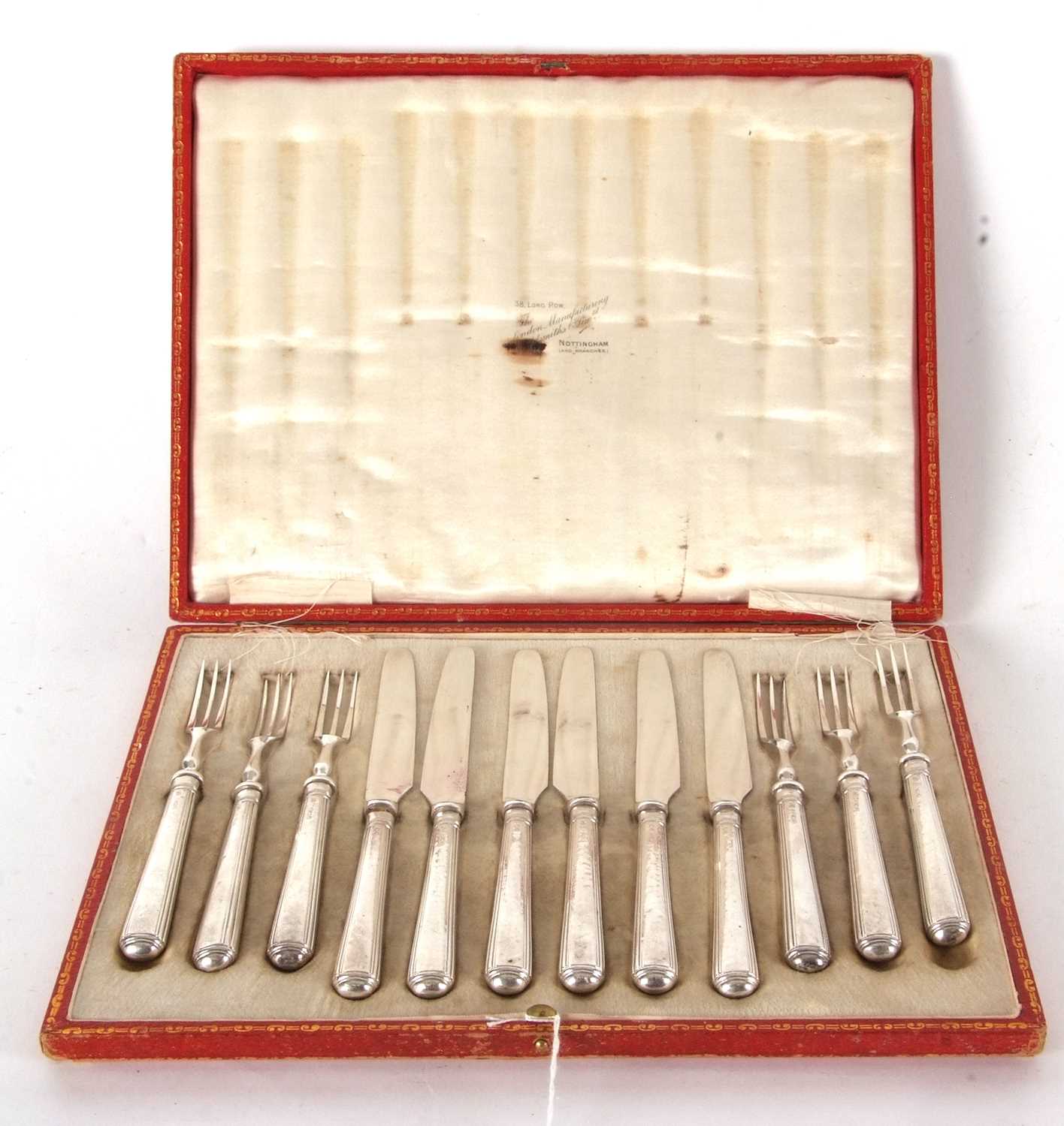 Lot 79 - A cased set of six pairs of silver handled...