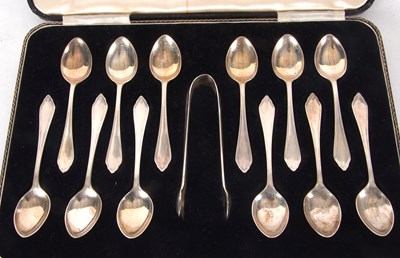 Lot 82 - A cased set of twelve silver teaspoons,...