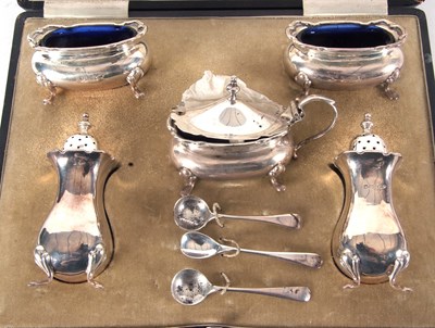Lot 85 - A cased George V silver condiment set...