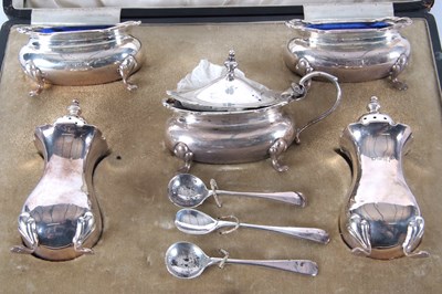 Lot 85 - A cased George V silver condiment set...