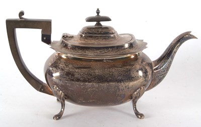 Lot 91 - A George V silver teapot of plain rectangular...