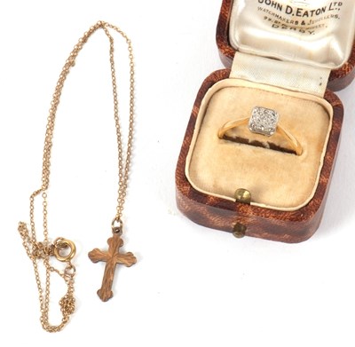Lot 35 - An 18ct and platinum ring and a 9ct cross...