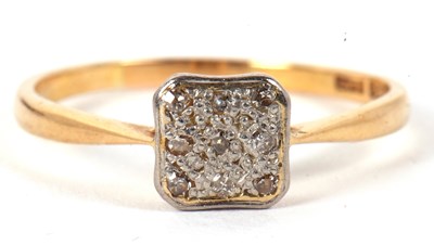 Lot 35 - An 18ct and platinum ring and a 9ct cross...