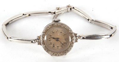 Lot 274 - A precious metal ladies cocktail watch, the...