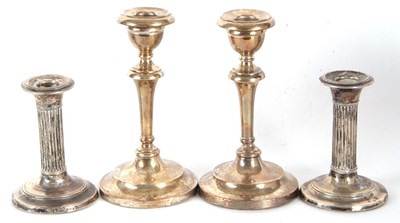 Lot 170 - A pair of Edwardian candlesticks with...