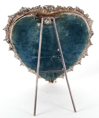 Lot 203 - An antique formerly silver plated heart shaped...
