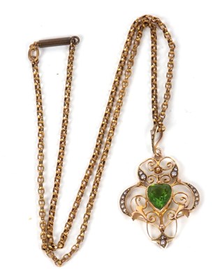 Lot 41 - An Edwardian peridot pendant and gilt metal...