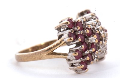 Lot 2 - A 9ct ruby and diamond bow ring, the bow set...