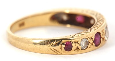 Lot 11 - A 9ct ruby and diamond ring, set with...