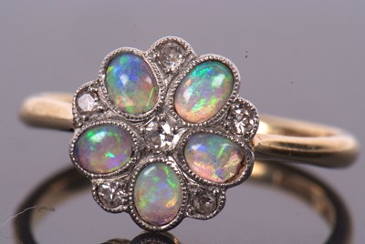 Lot 3 - An 18ct and platinum opal and diamond ring,...