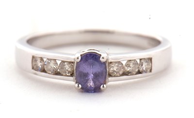 Lot 4 - A 9ct tanzanite and diamond ring, the central...