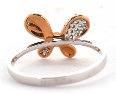 Lot 8 - A two tone 18ct diamond butterfly ring, the...