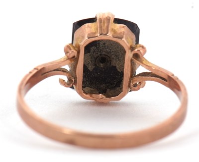 Lot 12 - A 9ct ring, the black onyx plaque with intial...