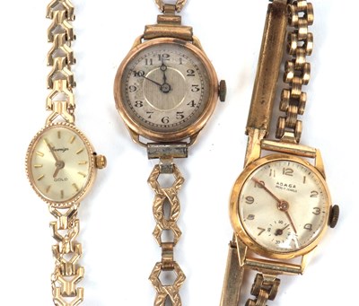 Lot 83 - Three gold cased lady's wristwatches: to...