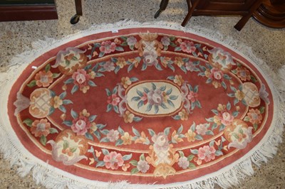 Lot 396 - CHINESE OVAL WOOL FLOOR RUG DECORATED WITH...