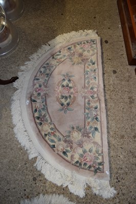 Lot 403 - CHINESE FLORAL DECORATED WOOL HEARTH RUG,...