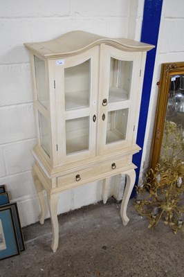 Lot 406 - 20TH CENTURY CREAM PAINTED DISPLAY CABINET,...