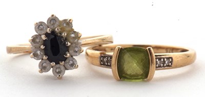 Lot 33 - Two 9ct rings: to include a 9ct peridot and...