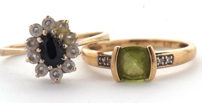 Lot 33 - Two 9ct rings: to include a 9ct peridot and...