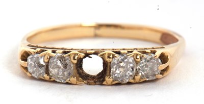Lot 14 - A diamond ring, set with four old mine cut...