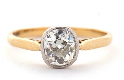 Lot 27 - An 18ct single stone diamond ring, the oval...