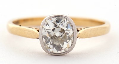 Lot 27 - An 18ct single stone diamond ring, the oval...