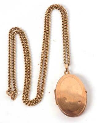 Lot 84 - A locket and chain, the oval locket, 3.3cm...