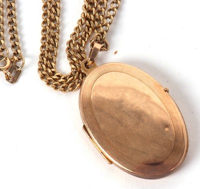 Lot 84 - A locket and chain, the oval locket, 3.3cm...