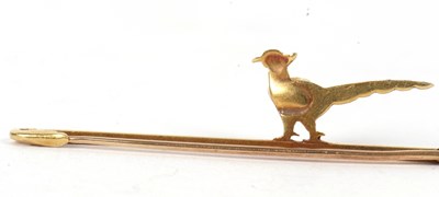Lot 72 - A 15ct pheasant bar brooch, the pheasant...