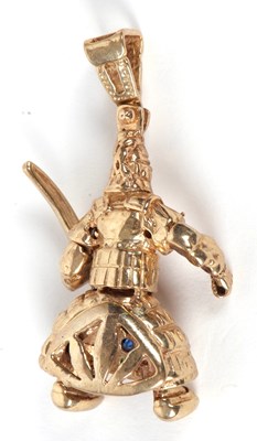 Lot 47 - A 9ct samurai pendant, the figure in samurai...