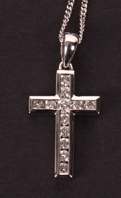 Lot 63 - An 18ct and diamond cross and chain, the cross...