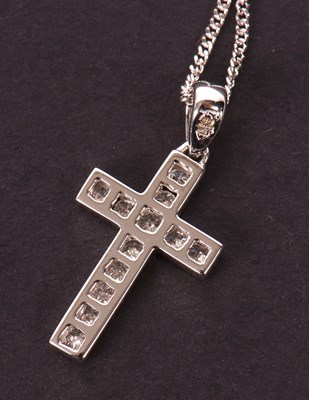 Lot 63 - An 18ct and diamond cross and chain, the cross...