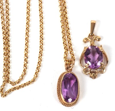 Lot 79 - Two amethyst pendants, the first a 9ct oval...