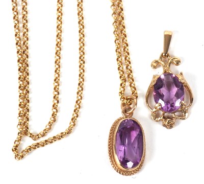 Lot 79 - Two amethyst pendants, the first a 9ct oval...