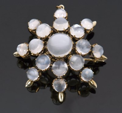 Lot 303 - A moonstone 'star' brooch, the star shape...