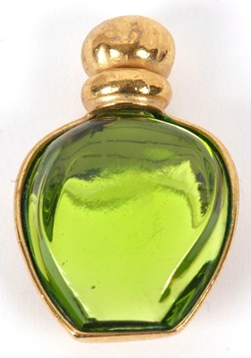 Lot 105 - A Christian Dior brooch, the miniature perfume...